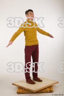 Whole body yellow sweater red trousers brown shoes of Sidney…